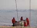 Belgians preparing equipment for skidoo